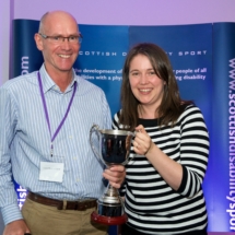 Graham Cook receiving the Findlay Calder Trophy on behalf of Libby Clegg