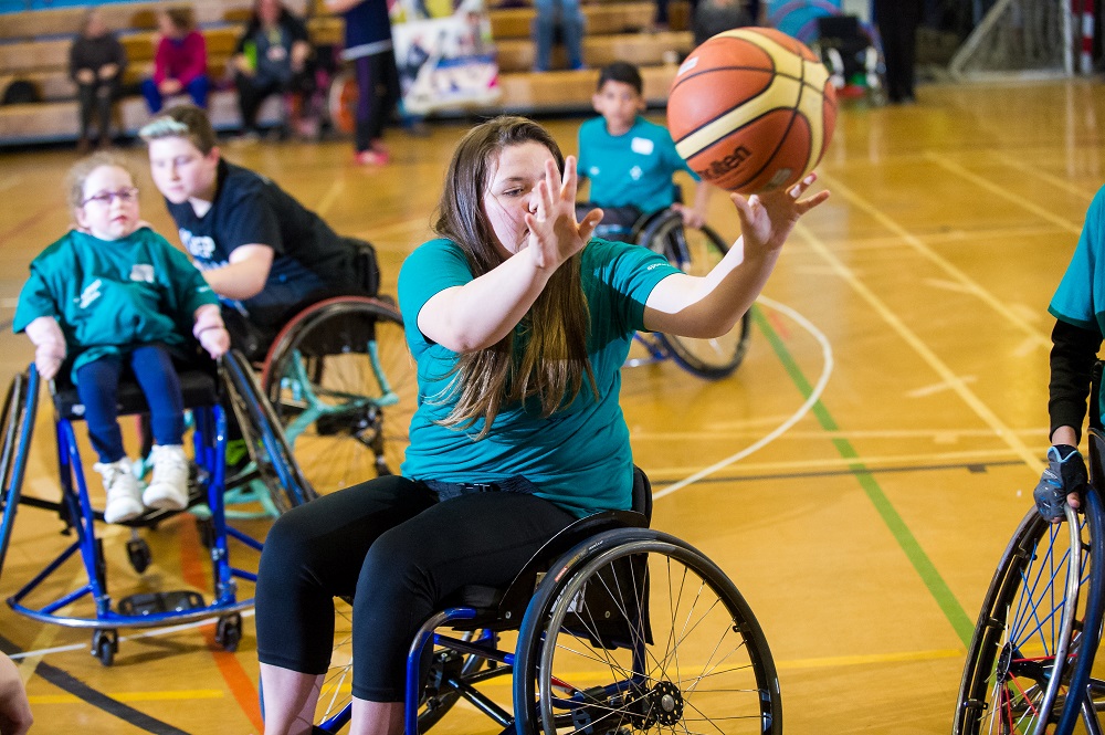 centralparasport2016girlplayingwheelchairbasketball