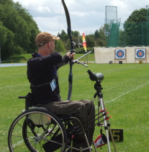 Brad Stewart taking aim at archery target